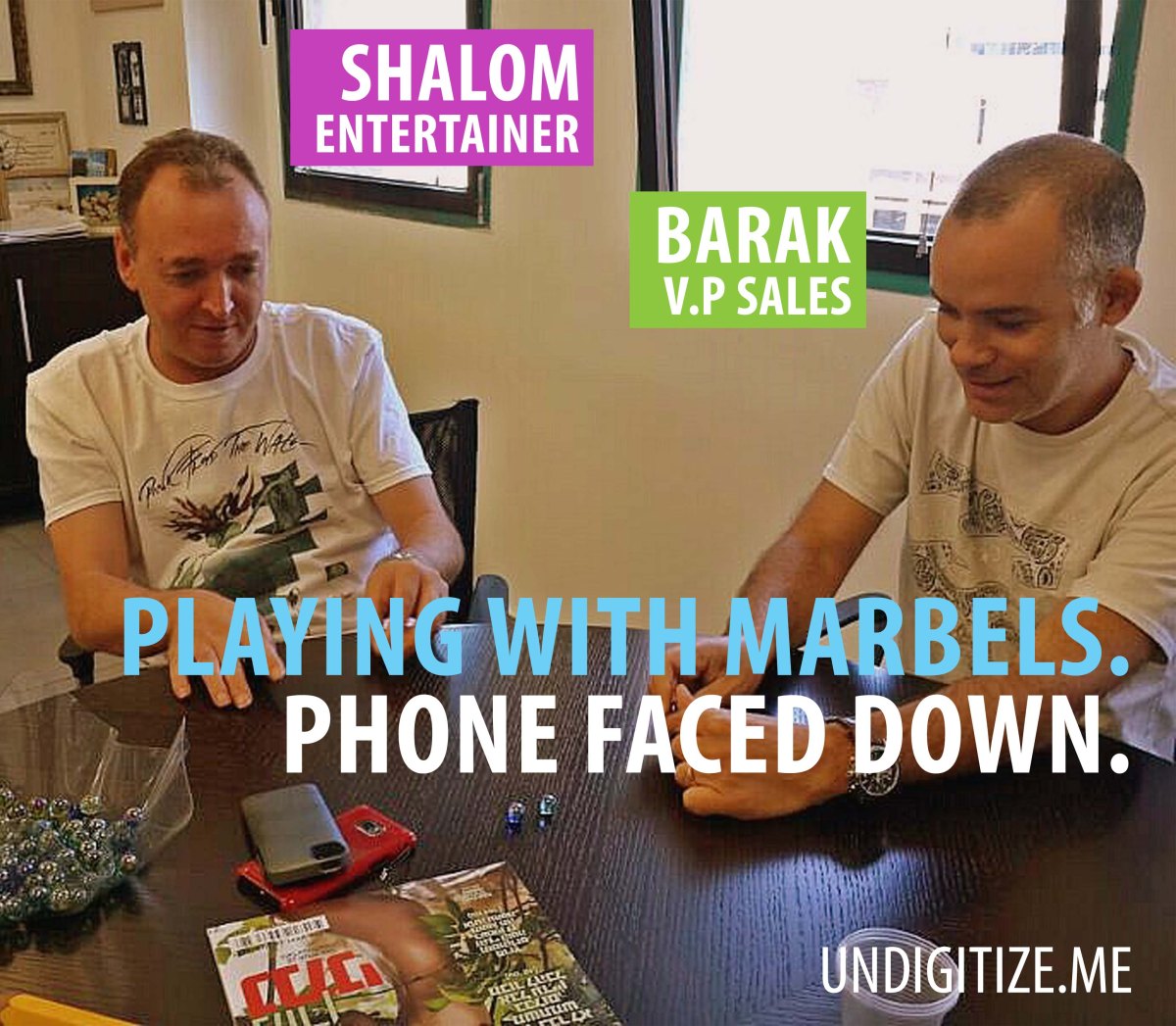 Playing With Marbles. Phone Faced Down.