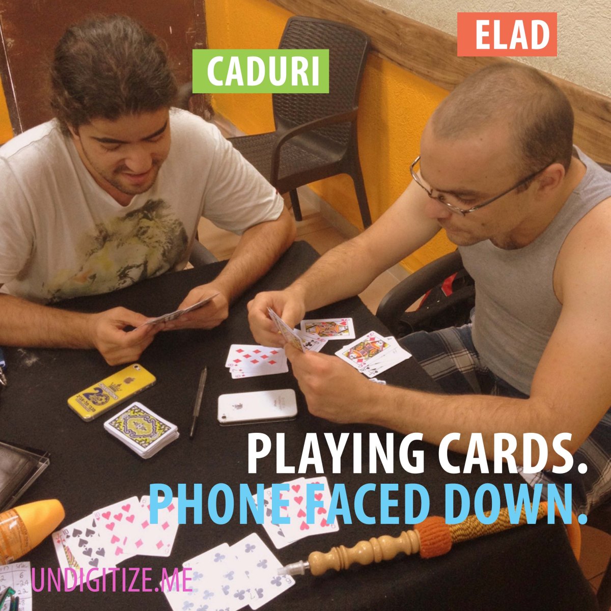 Playing Cards. Phone Faced Down.