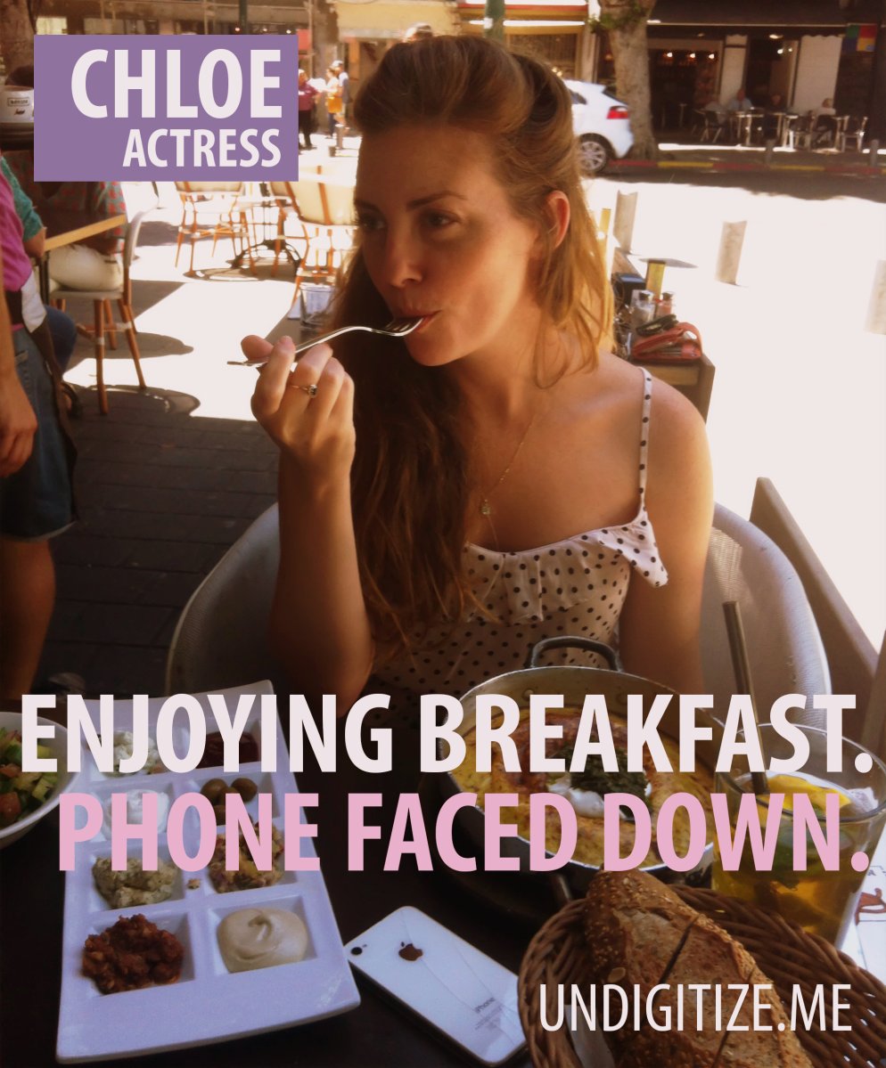 Enjoying Breakfast. Phone Faced Down.