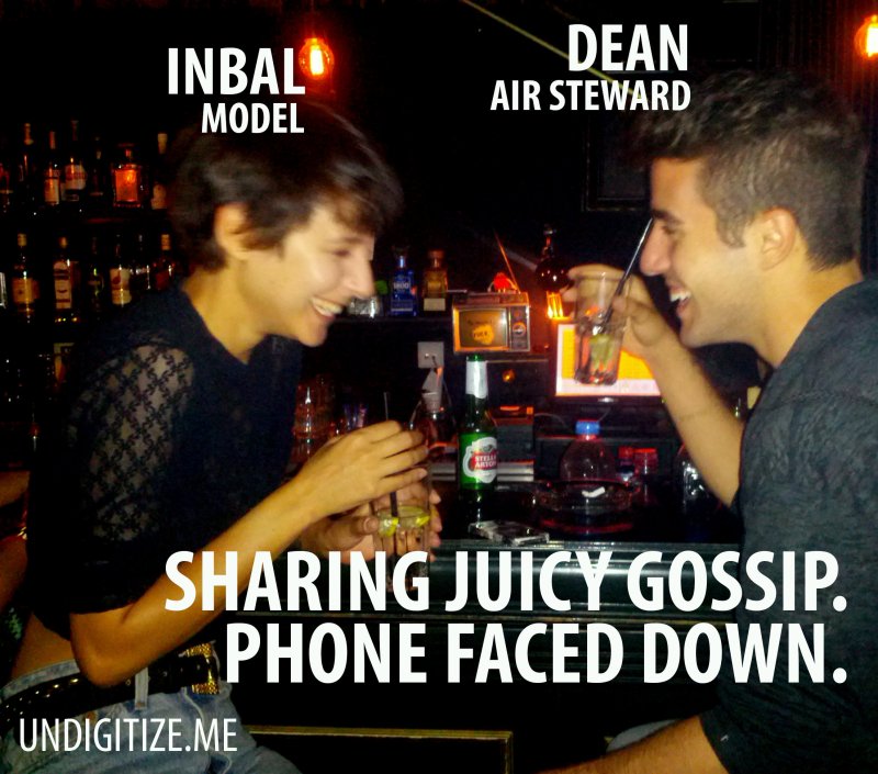 Sharing Juicy Gossip. Phone Faced Down.
