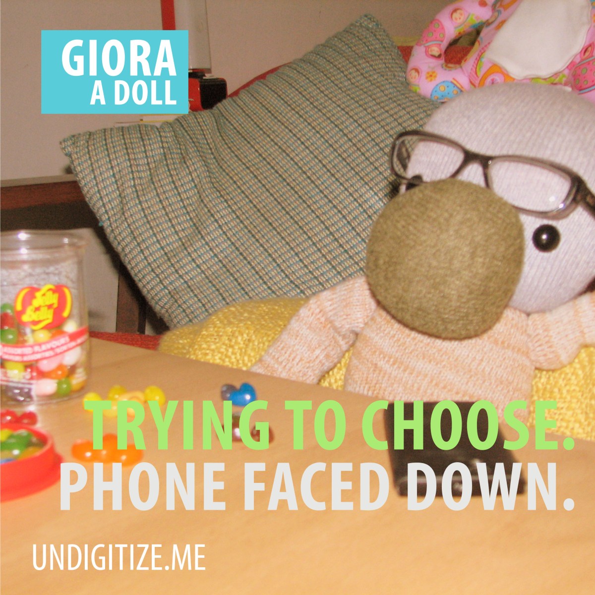 Trying To Choose. Phone Faced Down.