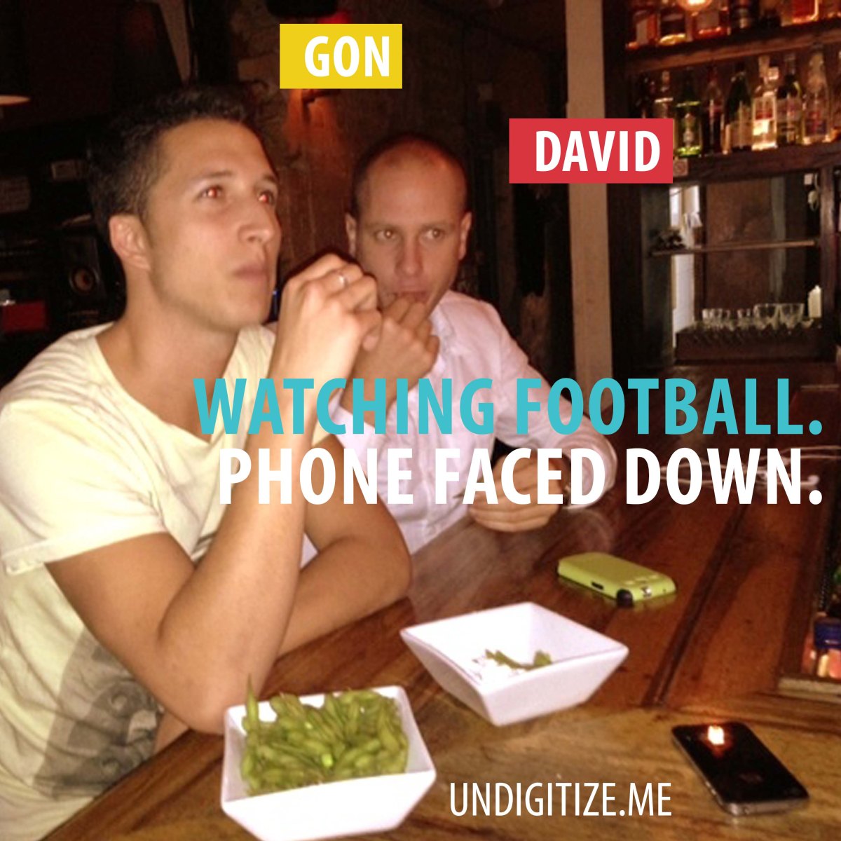 Watching Football. Phone Faced Down.