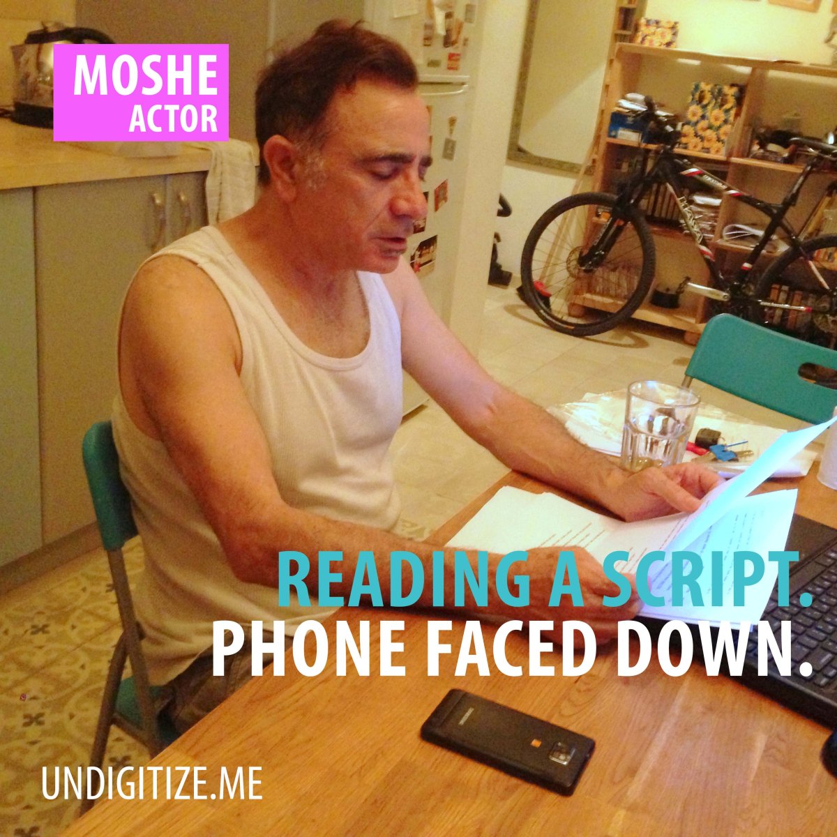 Reading A Script. Phone Faced Down.