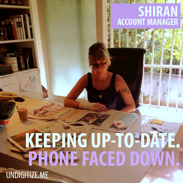 Keeping Up-To-Date. Phone Faced Down