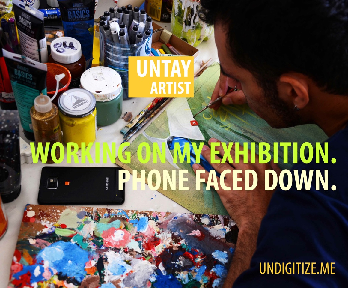 Working On My Exhibition. Phone Faced Down.